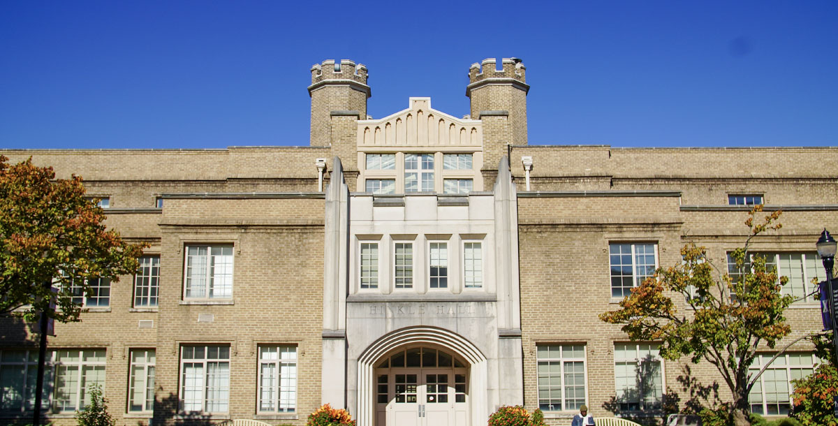 Photo of Xavier campus of a building with a blue sky