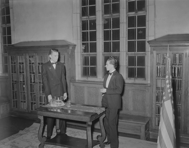   Students (William Roll and Bernard Gilday) debate in Conaton Board Room, February 21, 1941, XUA-125 Xavier University Photographic Negative Collection, University Archives and Special Collections, Xavier University Library