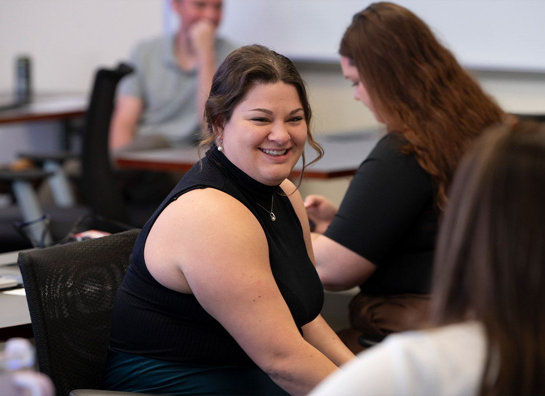 Xavier MBA Student smiling in class