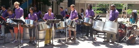 Photo of Xavier Students playing with drums