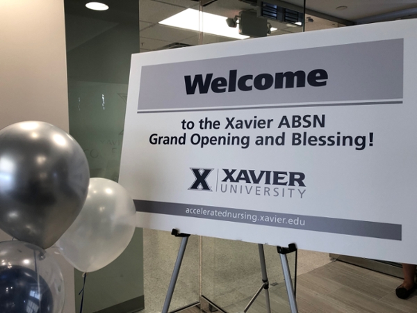 Welcome sign for Columbus ABSN grand opening