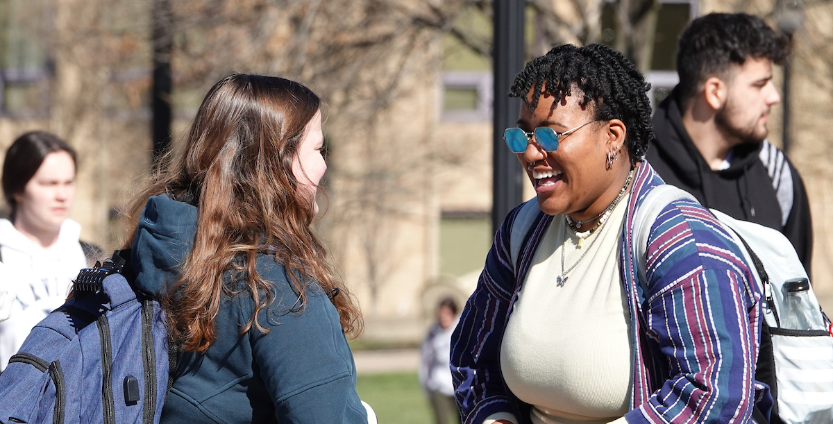 Students laughing on the Xavier yard 